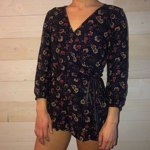 navy floral romper by American Eagle